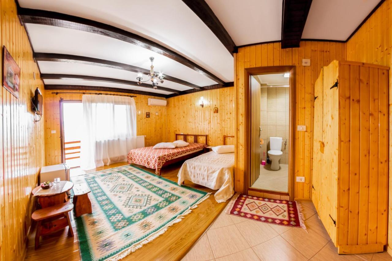 Pensiunea La Maria Lu' Sandoiu Hotel Poenari Exterior foto